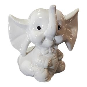 Vintage glossy white ceramic elephant ring holder